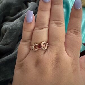 Elegant Gold-Tone Ring with Red Gemstone